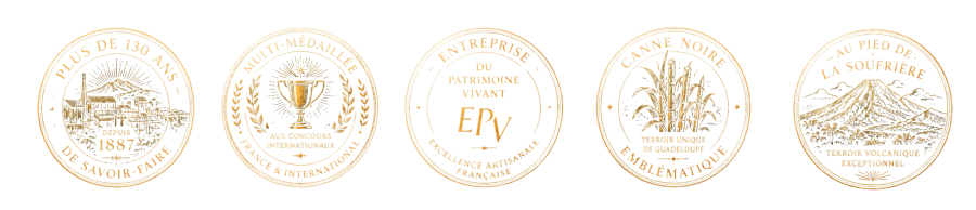 Distinctions Rhum Bologne : plus de 130 ans de savoir-faire (depuis 1887), multi-médaillé aux concours internationaux, label Entreprise du Patrimoine Vivant, canne noire emblématique, terroir volcanique au pied de la Soufrière